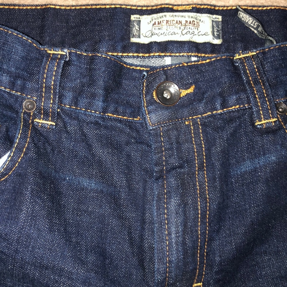 Men’s American Rag Slim Straight Denim jeans.